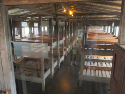 Prisoner barracks beds.